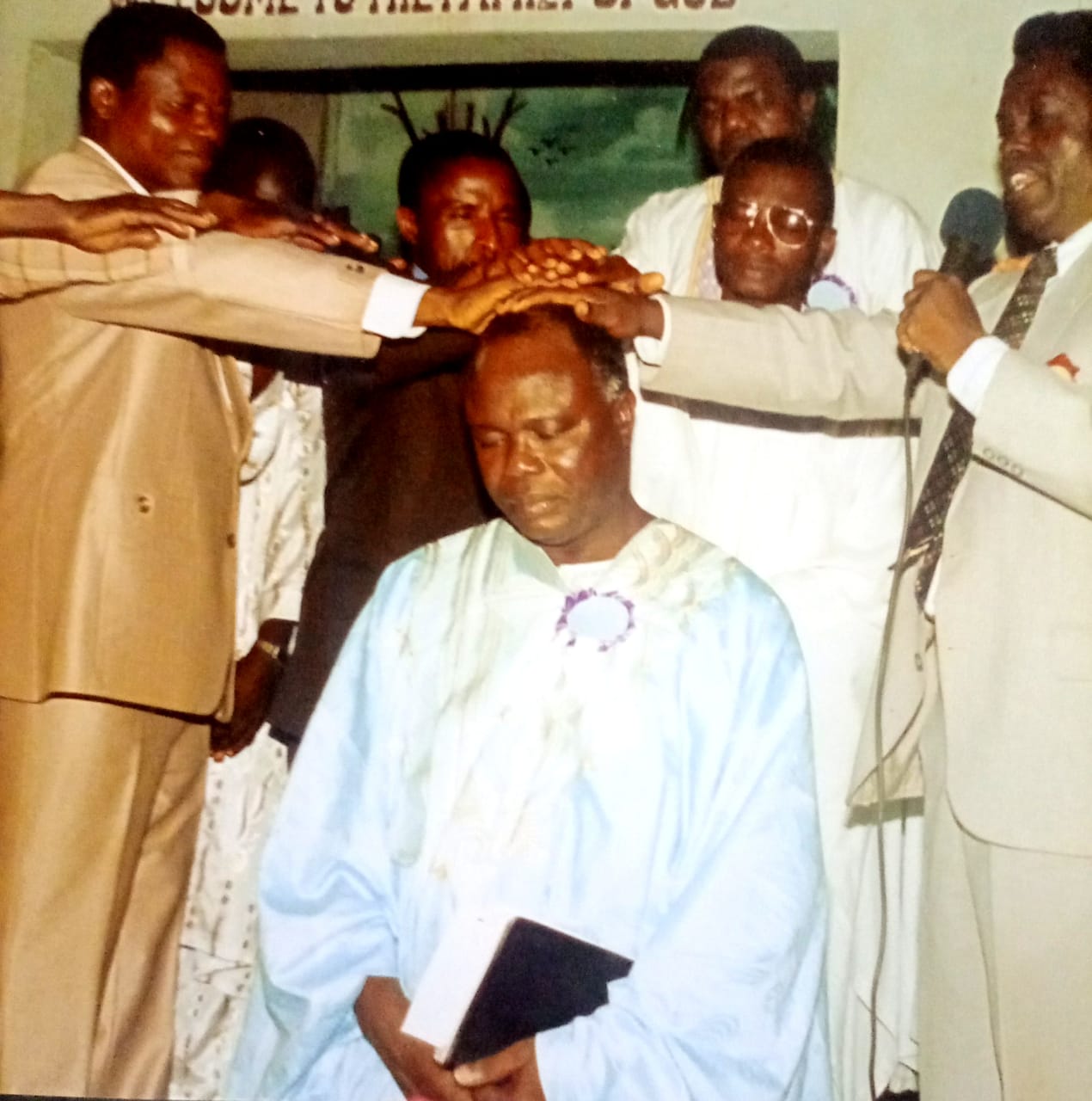 Professor Osagie during a Christian prayer ceremony